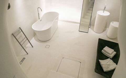 Kameni: Floor, Interior Design, Flooring, Ceiling, Bathtub, Bathroom, Design, Light Fixture, Plaster, Plumbing Fixture
