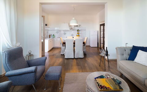 Sun Stone: Furniture, Interior Design, Flooring, Floor, Couch, Room, Wood, Table, Ceiling, Living Room
