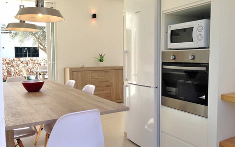 Nure Villa 2: Furniture, Interior Design, Flooring, Floor, Countertop, Kitchen, Cabinetry, Chair, Wood, Light Fixture