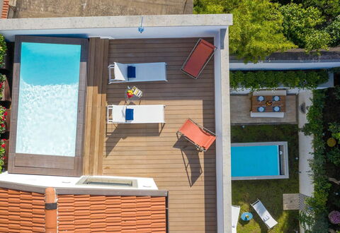 The Ivy Penthouse: Swimming Pool, Composite Material, Leisure, Outdoor Furniture, Resort, Wood Stain, Eco Hotel, Shade, Chair, Deck