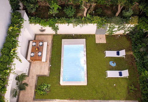 Jacaranda House: Swimming Pool, Outdoor Furniture, Resort, Garden, Leisure, Water Feature, Backyard, Courtyard, Eco Hotel, Landscaping