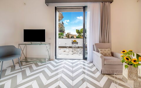 Suite Agave: Flooring, Floor, Interior Design, Furniture, Room, Living Room, Apartment, Wood Flooring, Ceiling, Chair