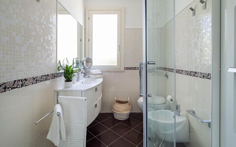 Villa Rossini: Bathroom, Plumbing Fixture, Bathroom Sink, Flooring, Sink, Toilet, Interior Design, Floor, Toilet Seat, Tap