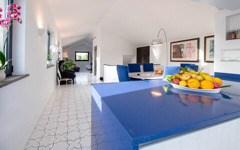 The Ivy Villa: Blue, Interior Design, Flooring, Floor, Ceiling, Kitchen, Furniture, Tile, Countertop, Room