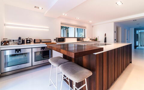 Villa Sound: Interior Design, Furniture, Flooring, Countertop, Kitchen, Wood, Ceiling, Cabinetry, Light Fixture, Kitchen Appliance