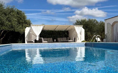 Trulli Maria: Blue, Swimming Pool, Composite Material, Resort, Shade, Leisure, Outdoor Furniture, Hotel, Water Feature, Eco Hotel