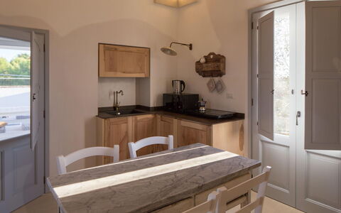 Villa Salentina: Furniture, Flooring, Wood, Interior Design, Floor, Kitchen, Countertop, Ceiling, Cabinetry, Lighting
