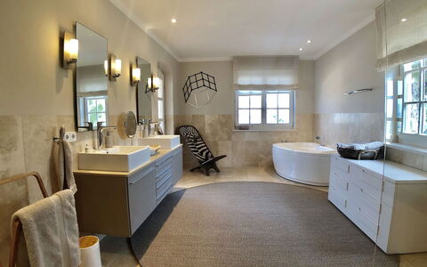 Villa Serrano: Interior Design, Flooring, Floor, Plumbing Fixture, Bathroom, Furniture, Home, Bathroom Cabinet, Lighting, Tap