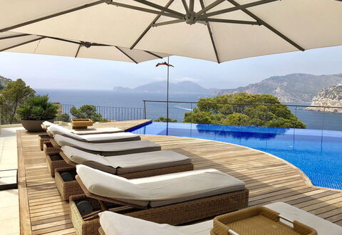 Villa Serrano: Furniture, Umbrella, Outdoor Furniture, Swimming Pool, Sunlounger, Chair, Resort, Shade, Outdoor Table, Patio
