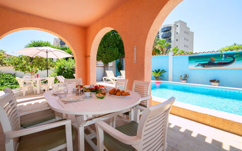 Sandra: Furniture, Water, Table, Building, Plant, Azure, Interior Design, Architecture, Outdoor Furniture, Chair