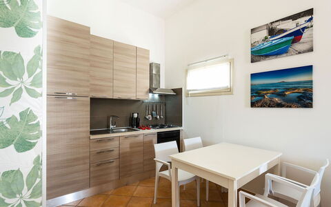 Kalimba: Interior Design, Flooring, Furniture, Floor, Wood, Room, Kitchen, Major Appliance, Kitchen Appliance, Ceiling
