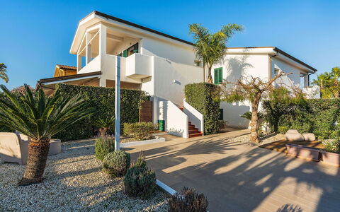Ninfa: Building, Residential Area, House, Home, Architecture, Facade, Shrub, Roof, Estate