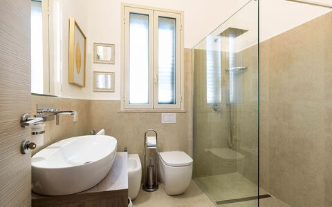 Ninfa: Bathroom, Flooring, Plumbing Fixture, Interior Design, Floor, Toilet, Toilet Seat, Wall, Bathroom Sink, Sink