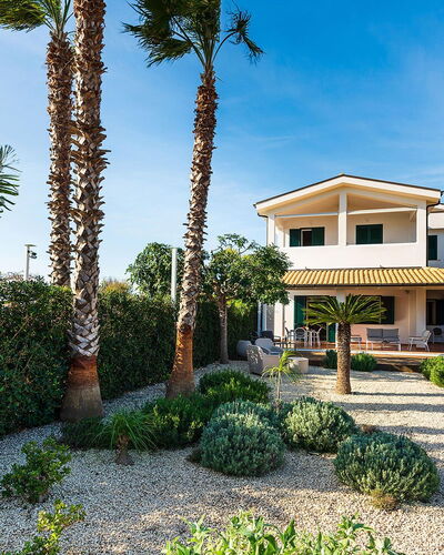 Stella Marina: Residential Area, House, Architecture, Home, Shrub, Estate, Garden, Landscaping, Driveway
