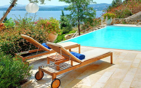 Red Villa: Furniture, Outdoor Furniture, Umbrella, Sunlounger, Swimming Pool, Resort, Chair, Leisure, Shade, Eco Hotel