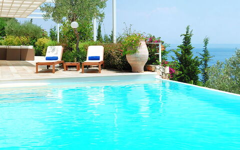 Red Villa: Blue, Swimming Pool, Resort, Flowerpot, Furniture, Eco Hotel, Chair, Outdoor Furniture, Shade, Houseplant