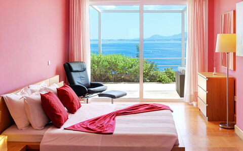 Red Villa: Furniture, Interior Design, Bedroom, Bed, Textile, Floor, Room, Flooring, Home, Bed Sheet