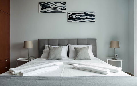 Villa Eftychia: Furniture, Bed, Interior Design, Bedroom, Floor, Flooring, Bedding, Room, Wood, Bed Sheet