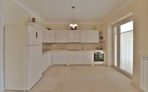 Masseria Ostuni: Flooring, Floor, Cabinetry, Interior Design, Countertop, Kitchen, Wood, Ceiling, Furniture, Lighting