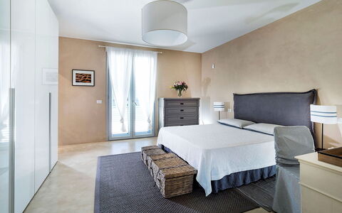 Villa Orangella: Furniture, Interior Design, Bed, Wall, Flooring, Floor, Bedroom, Wood, Ceiling, Room