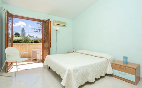 Villa Acquamarina: Interior Design, Wall, Floor, Flooring, Bed, Wood, Furniture, Bedroom, Bed Sheet, Room