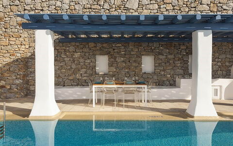 Villa Ipoliti: Composite Material, Shade, Swimming Pool, Column, Natural Material, Chair, Design, Tile, Outdoor Furniture, Pergola