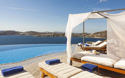 Villa Anassa: Blue, Outdoor Furniture, Swimming Pool, Resort, Umbrella, Sea, Sunlounger, Leisure, Shade, Chair