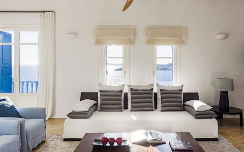 Villa Anassa: Furniture, Interior Design, Couch, Throw Pillow, Textile, Living Room, Flooring, Floor, Window Covering, Home