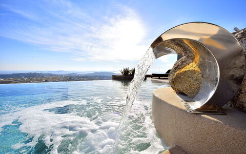 Villa Ivory: Blue, Water, Fountain, Water Feature, Sunlight, Hotel, Wave