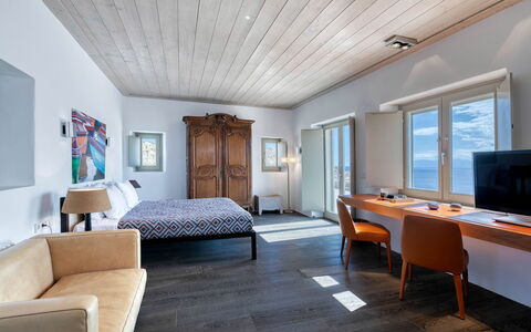 Villa Virgil: Furniture, Interior Design, Flooring, Floor, Bedroom, Bed, Ceiling, Wood, Room, Lighting