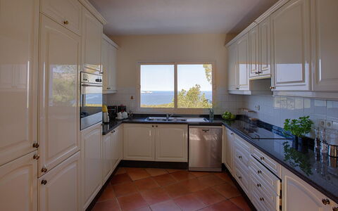 Baloo: Kitchen, Countertop, Kitchen Appliance, Cabinetry, Interior Design, Flooring, Furniture, Major Appliance, Wood, Floor