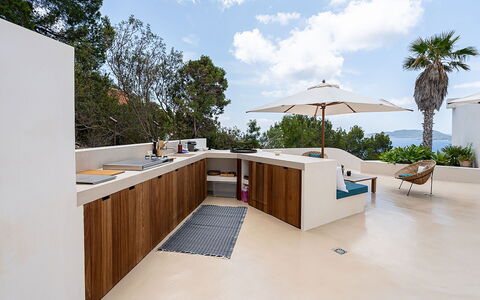 Villa Tagada: Wood, Flooring, Furniture, Floor, Kitchen, Countertop, Chair, Wood Stain, Shade, Hardwood