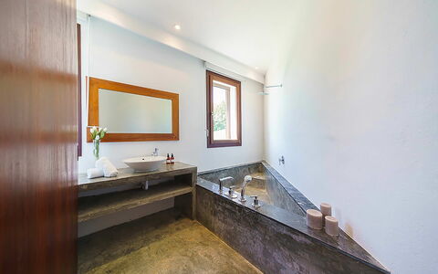 Villa Francisca: Flooring, Wood, Floor, Interior Design, Plumbing Fixture, Ceiling, Lighting, Tap, Bathroom, Plumbing