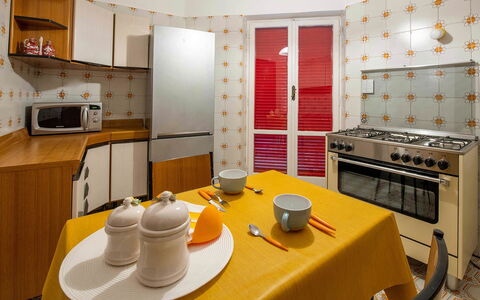 Apartment Amina: Interior Design, Flooring, Wood, Floor, Kitchen, Major Appliance, Room, Kitchen Appliance, Ceiling, Lighting