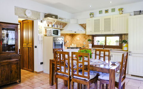 Villa Virna: Furniture, Interior Design, Flooring, Wood, Kitchen, Ceiling, Floor, Room, Table, Lighting