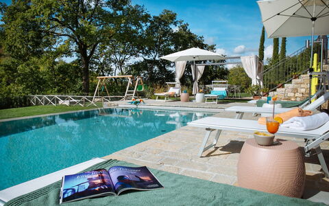 Villa Torre del Chianti: Swimming Pool, Outdoor Furniture, Furniture, Umbrella, Sunlounger, Resort, Leisure, Chair, Eco Hotel, Shade