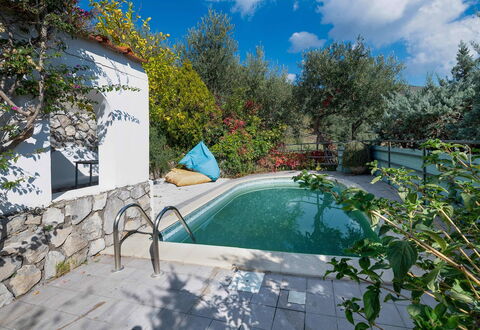 Villa Eva: Blue, Swimming Pool, Garden, Backyard, Shade, Water Feature, Landscaping, Outdoor Furniture, Resort, Eco Hotel