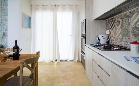 Villa Federica: Flooring, Furniture, Kitchen, Interior Design, Floor, Wood, Countertop, Major Appliance, Kitchen Appliance, Cabinetry