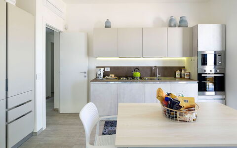 Thyme: Furniture, Kitchen, Interior Design, Countertop, Kitchen Appliance, Flooring, Wood, Cabinetry, Major Appliance, Floor