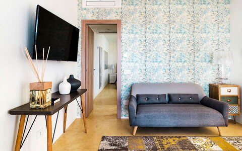 Villa Orietta: Furniture, Interior Design, Flooring, Textile, Floor, Table, Room, Home, Living Room, Wood Flooring