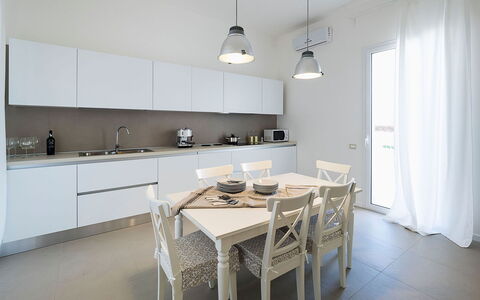 Villa Emma: Interior Design, Furniture, Flooring, Wood, Kitchen, Ceiling, Floor, Countertop, Room, Lighting