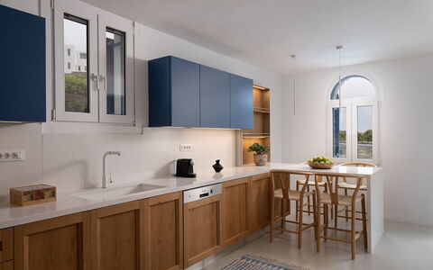 Villa Ioan: Furniture, Interior Design, Cabinetry, Flooring, Kitchen, Countertop, Cupboard, Wood Stain, Kitchen Appliance, Sink