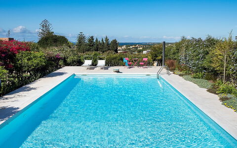 The Flower Garden: Blue, Swimming Pool, Water, Resort, Composite Material, Leisure, Outdoor Furniture, Eco Hotel, Shade, Landscaping