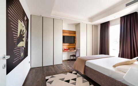 Sea Art Villa: Furniture, Interior Design, Bed, Flooring, Floor, Bedroom, Room, Wood, Bed Sheet, Bedding