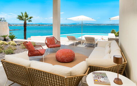 Sea Art Villa: Furniture, Outdoor Furniture, Chair, Resort, Sea, Coastal And Oceanic Landforms, Shade, Coast, Eco Hotel, Ocean