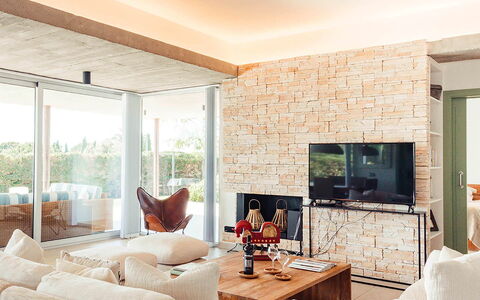 Villa Neper: Furniture, Wall, Interior Design, Flooring, Wood, Living Room, Couch, Floor, Ceiling, Stone Wall
