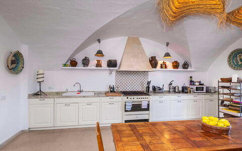 Finca Design: Interior Design, Flooring, Furniture, Kitchen, Ceiling, Lighting, Floor, Room, Countertop, Tile