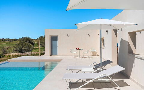 Villa Bruna: Composite Material, Swimming Pool, Concrete, Outdoor Furniture, Plaster, Limestone