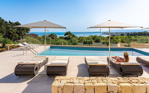 Villa Silvia: Furniture, Outdoor Furniture, Umbrella, Chair, Sunlounger, Swimming Pool, Resort, Shade, Eco Hotel, Leisure