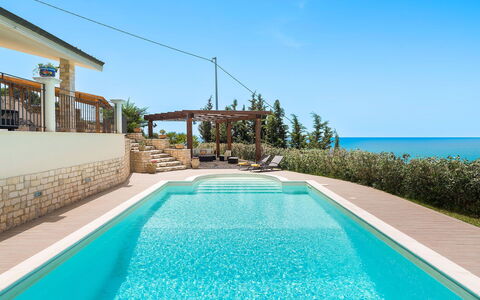 Villa Carousel: Blue, Water, Swimming Pool, Resort, Composite Material, Sea, Leisure, Outdoor Furniture, Eco Hotel, Ocean